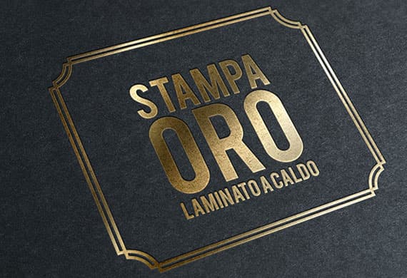 Testo dorato 'STAMPA ORO LAMINATO A CALDO' su carta nera con elegante cornice decorativa.